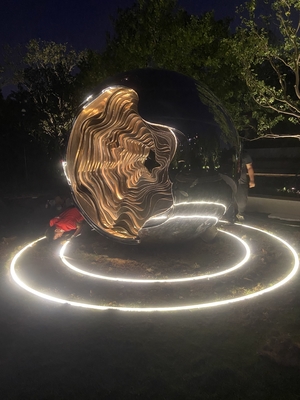 Outdoor garden at night large abstract sculpture LED lights with light wave changes welcome custom sculpture